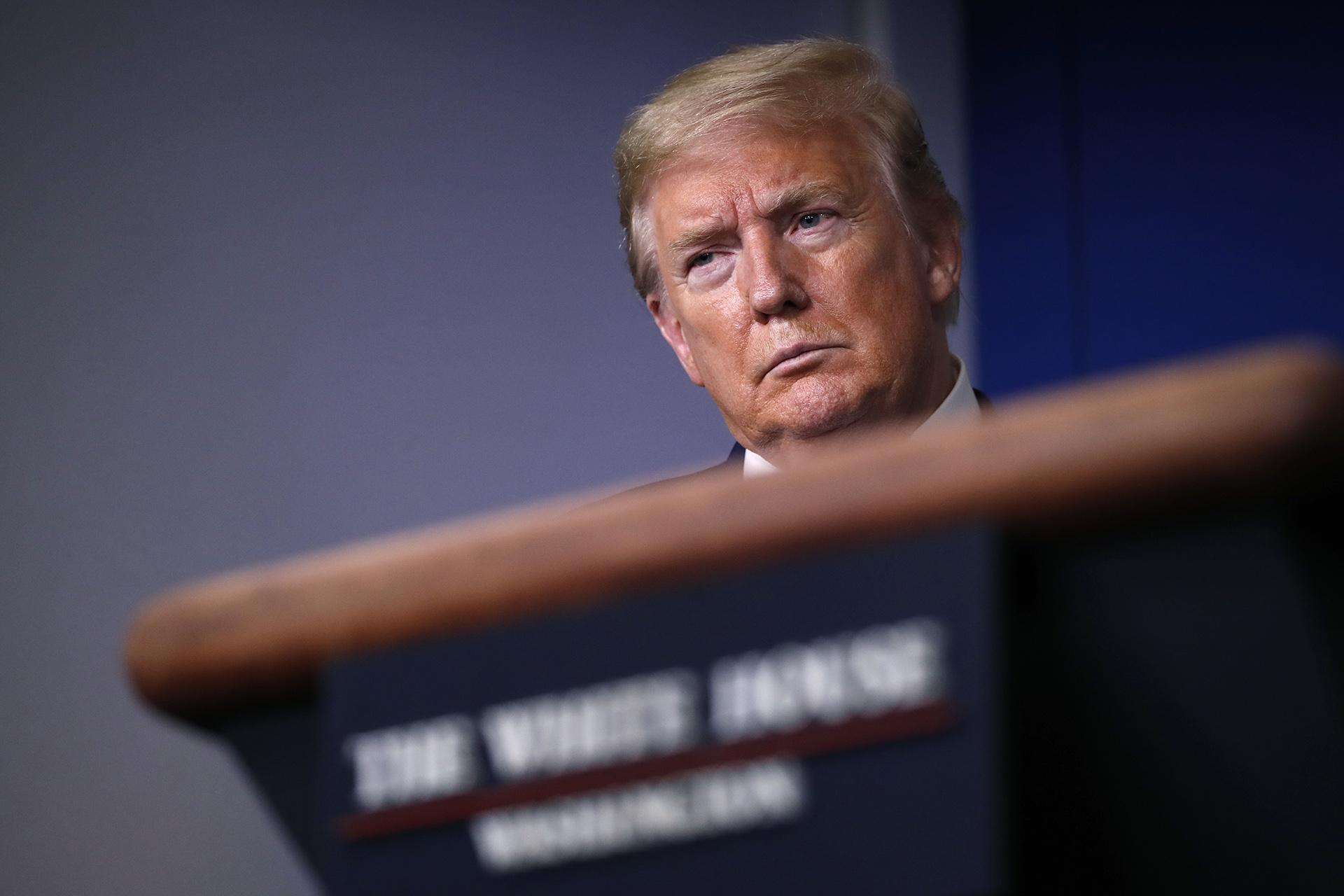 In this April 22, 2020, file photo, President Donald Trump listens during a briefing about the coronavirus in the James Brady Press Briefing Room of the White House, in Washington. (AP Photo / Alex Brandon, File)