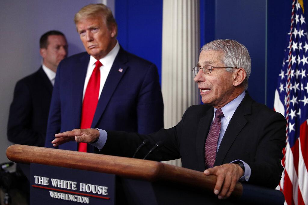 In this April 22, 2020, file photo, President Donald Trump listens as Dr. Anthony Fauci, director of the National Institute of Allergy and Infectious Diseases, speaks about the coronavirus in the James Brady Press Briefing Room of the White House in Washington. (AP Photo / Alex Brandon, File)