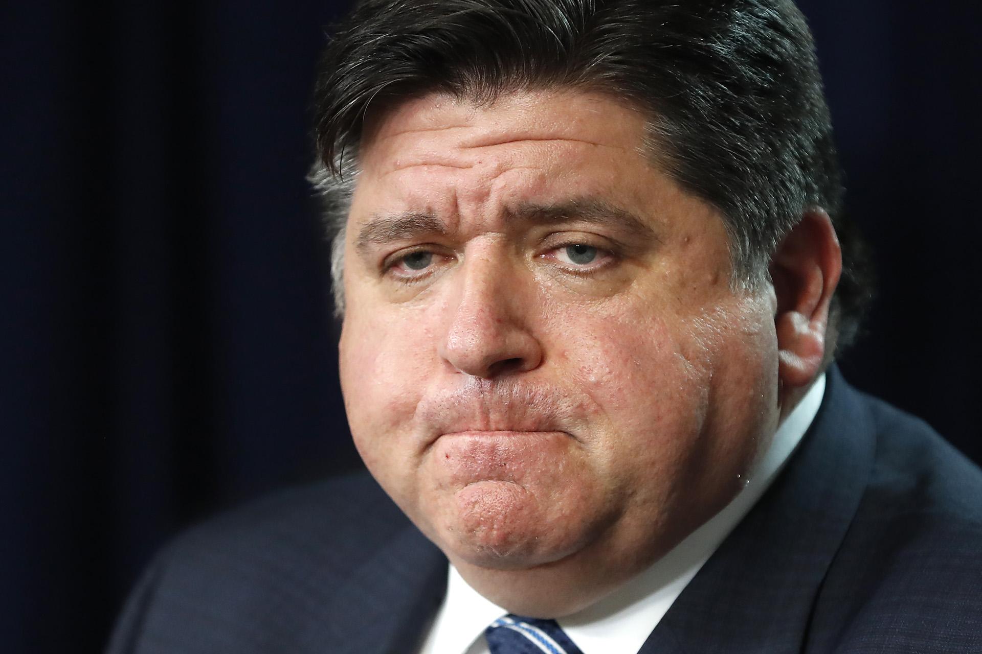 In this March 19, 2020 photo, Illinois Gov. J.B. Pritzker listens to a question during a news conference in Chicago. (AP Photo / Charles Rex Arbogast)