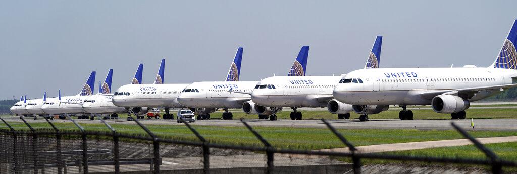 In this March 25, 2020 file photo, United Airlines planes are parked at George Bush Intercontinental Airport in Houston. (AP Photo / David J. Phillip, File)