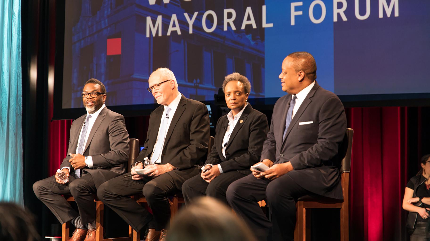 Brandon Johnson, Paul Vallas, Lori Lightfoot and Roderick Sawyer prepare for the start of the WTTW News Mayoral Forum on Feb. 7, 2023. (Michael Izquierdo / WTTW News) 