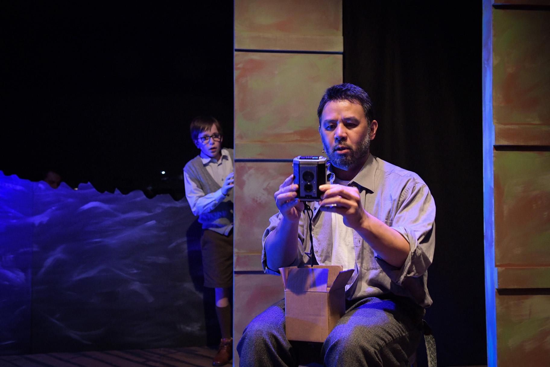 Leo Spiegel, left, and Karmann Bajuyo in “Whisper House.” (Photo by Evan Hanover)