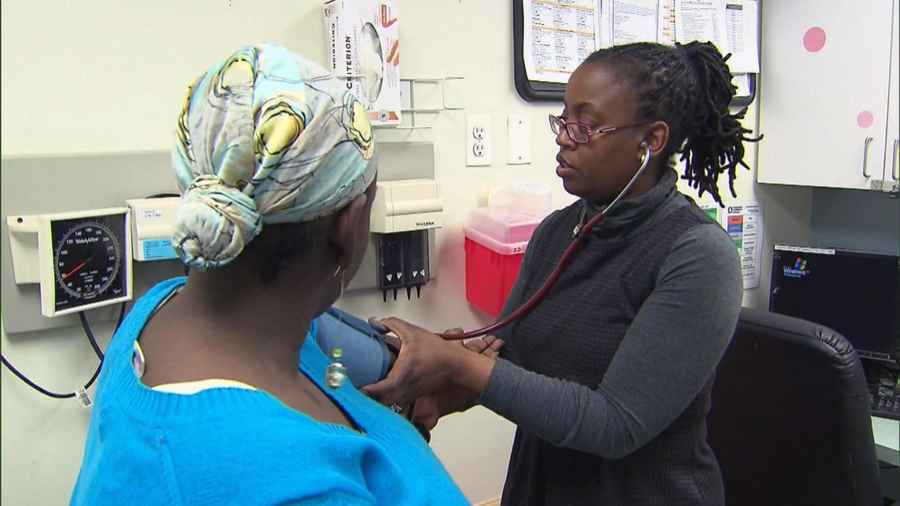 In this file photo, a patient gets her blood pressure checked. Disruption caused by the COVID-19 pandemic has meant that many women have missed important preventative health checks.  (WTTW News)