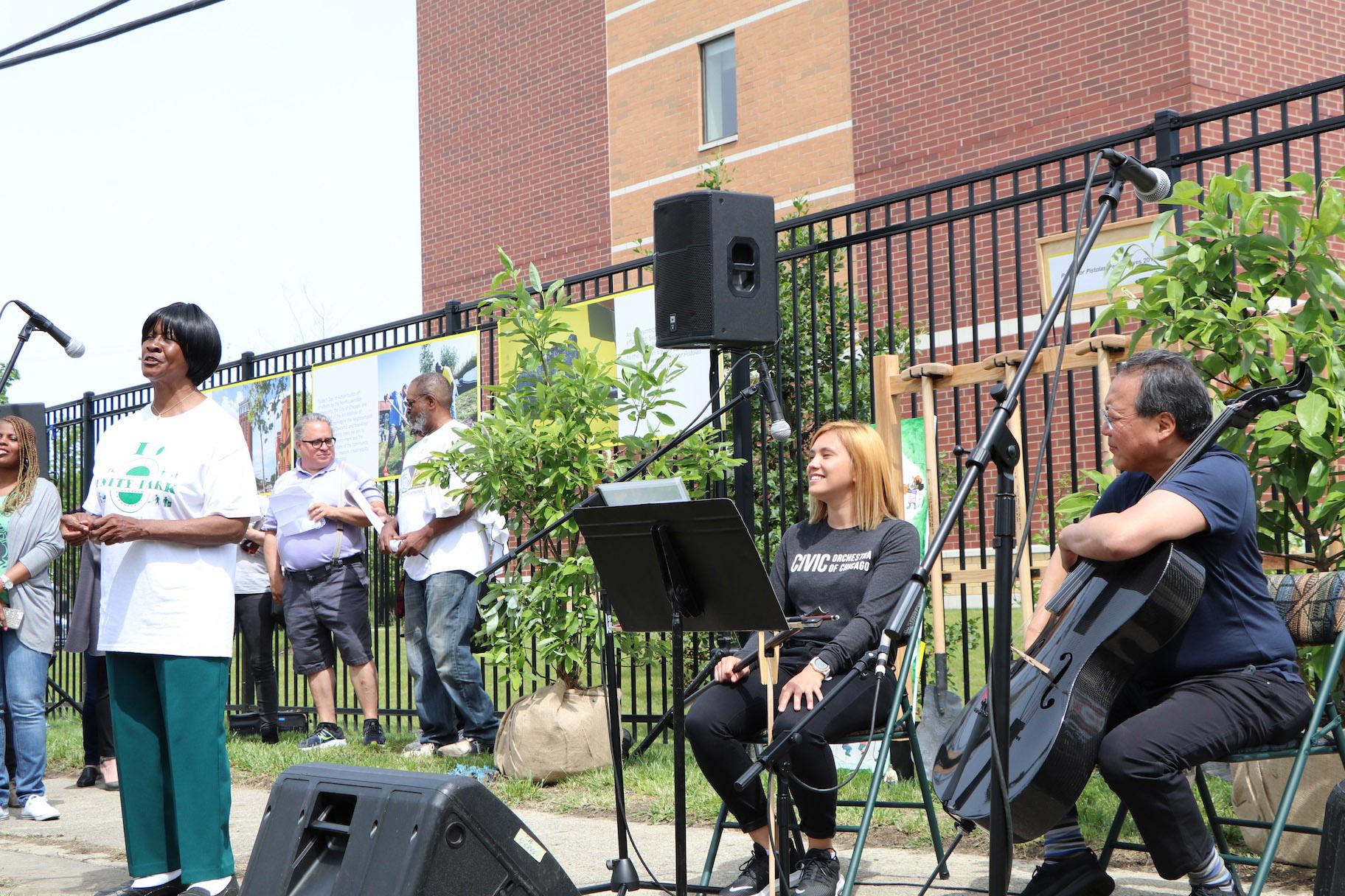 North Lawndale resident Gladys Woodson speaks at the Unity Park event. (Evan Garcia / WTTW)