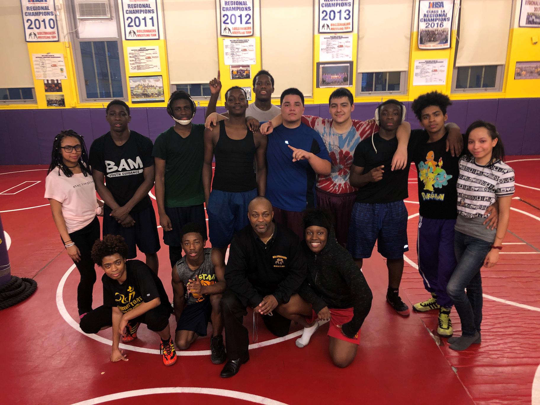 Chicago Wrestling Coach Pays It Forward While Building A Dynasty