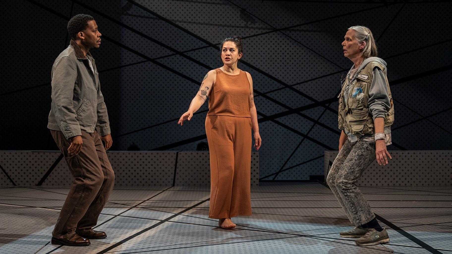 (left to right) Ensemble member Namir Smallwood, Sadieh Rifai and ensemble member Amy Morton in Steppenwolf Theatre’s Chicago premiere of “You Will Get Sick.” (Michael Brosilow)