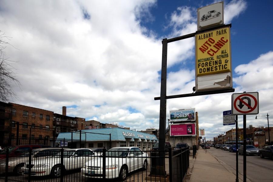 The Albany Park Auto Clinic sign misspells "foreign."