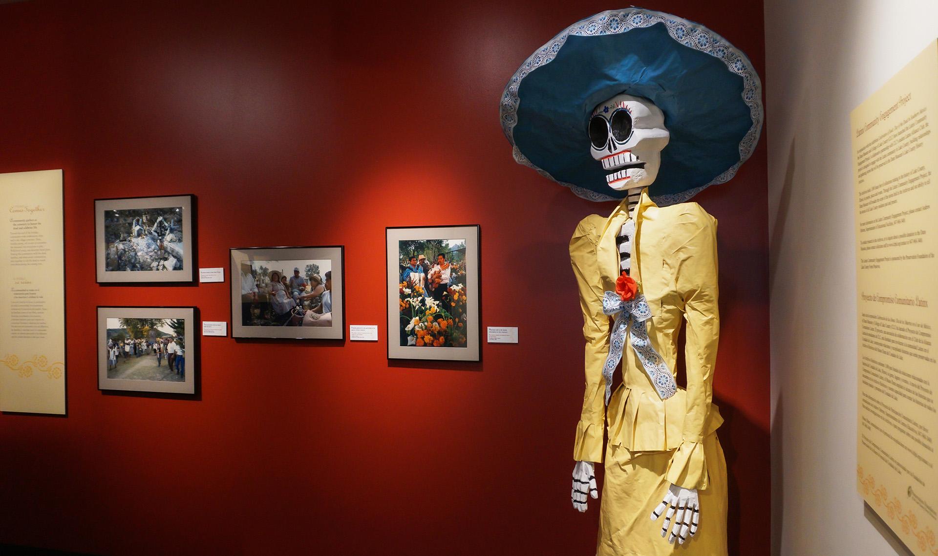 A strong and recognizable symbol of the Day of the Dead celebration is La Catrina, a tall female skeleton wearing bright clothing. Life-size catrinas are included in the exhibit.  (Courtesy of Lake County Forest Preserves)