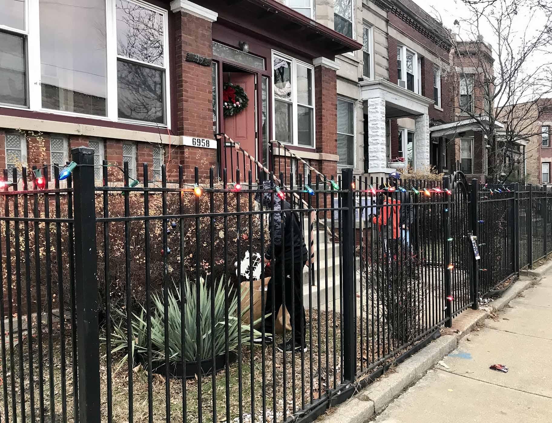 Holiday decorations along a 12-mile stretch of King Drive include select homes and street poles. (Ariel Parrella-Aureli / WTTW News)