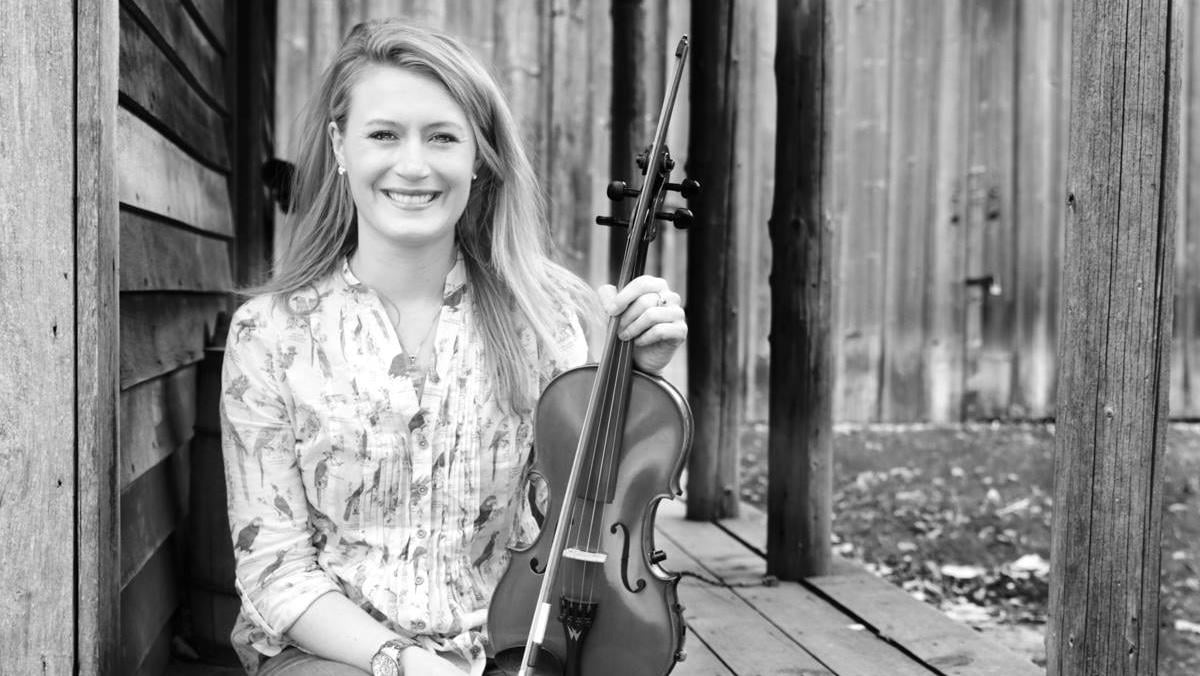 Katie Grennan, originally from Chicago, plays fiddle with Gaelic Storm. (Gaelic Storm / Facebook)