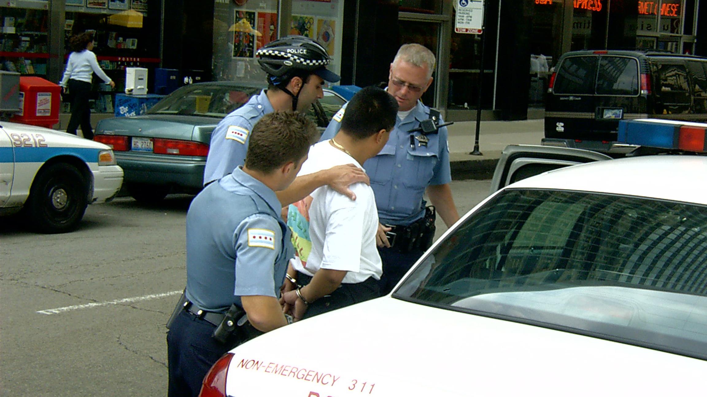 Chicago police make an arrest. (grendelkhan / Flickr)