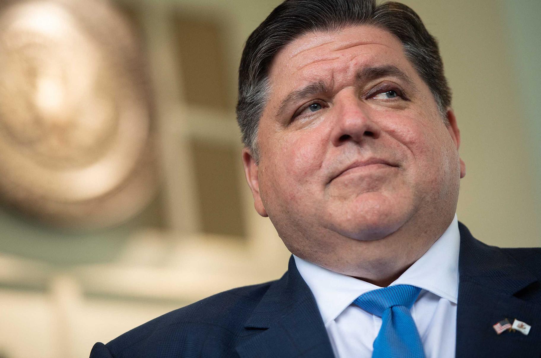 Illinois Gov. J.B. Pritzker, a Democrat, repealed a law criminalizing HIV. (Saul Loeb / AFP / Getty Images)