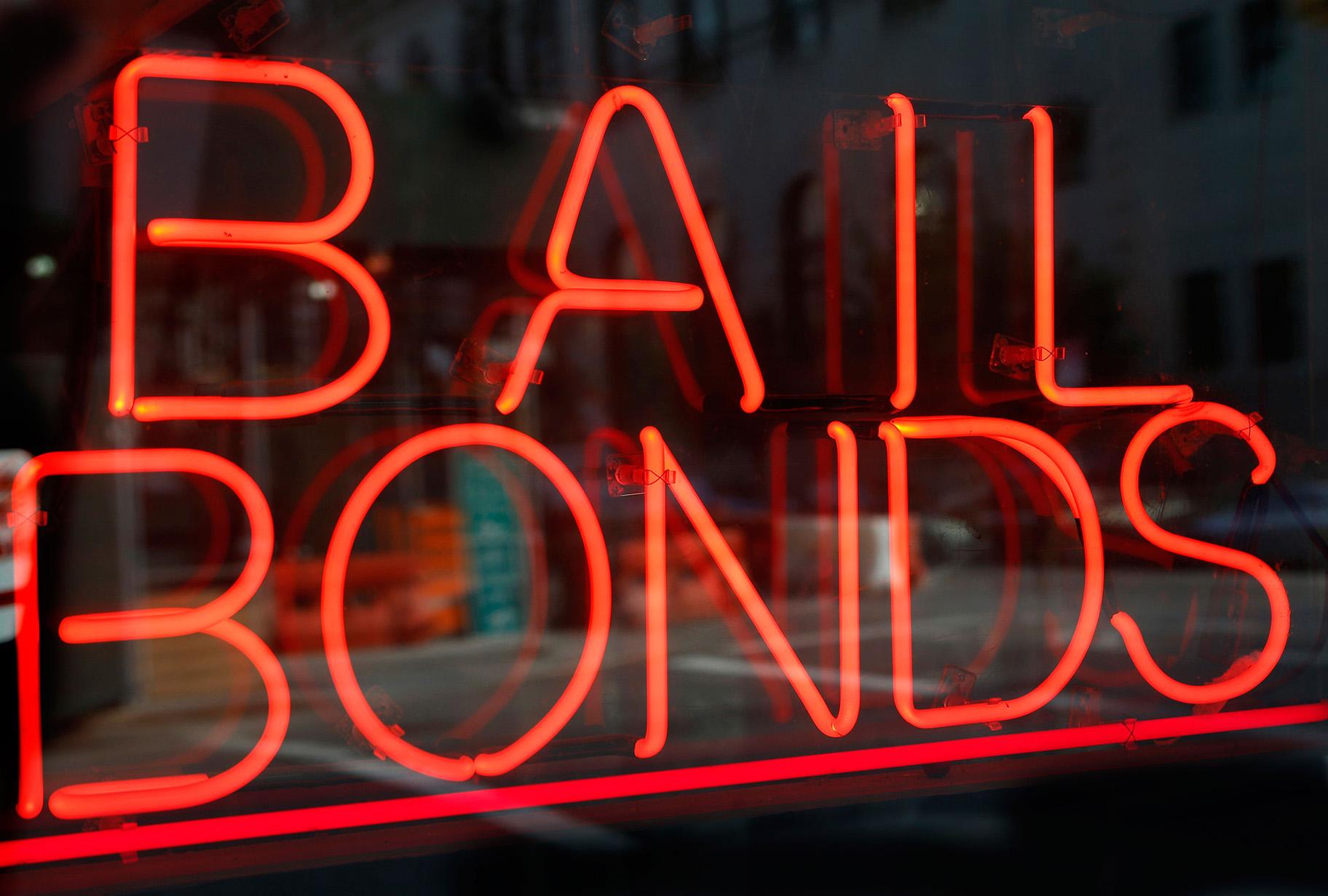 This file photo shows a sign advertising a bail bonds business in the Brooklyn borough of New York. (Kathy Willens / AP)