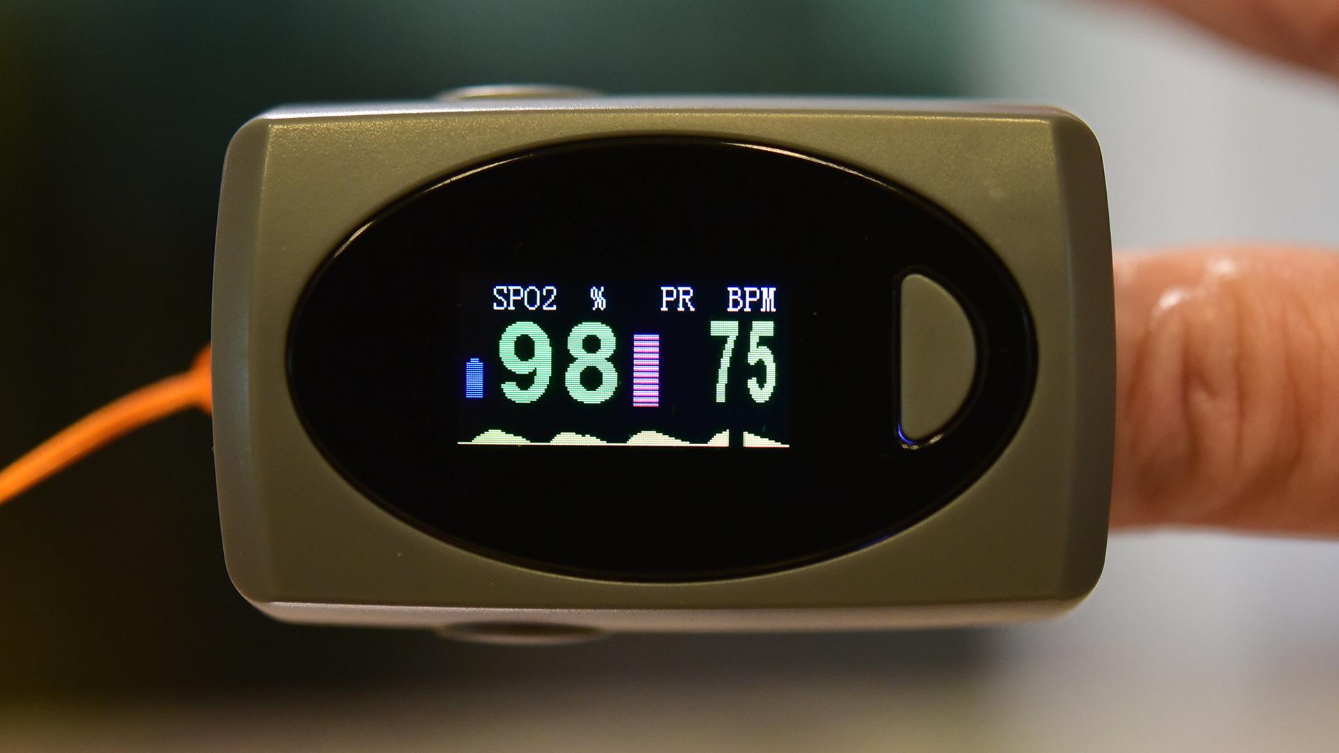 Included in the COVID-19 care kit given to patients is a pulse oximeter, which measures blood oxygen levels. (slgckgc / Flickr)