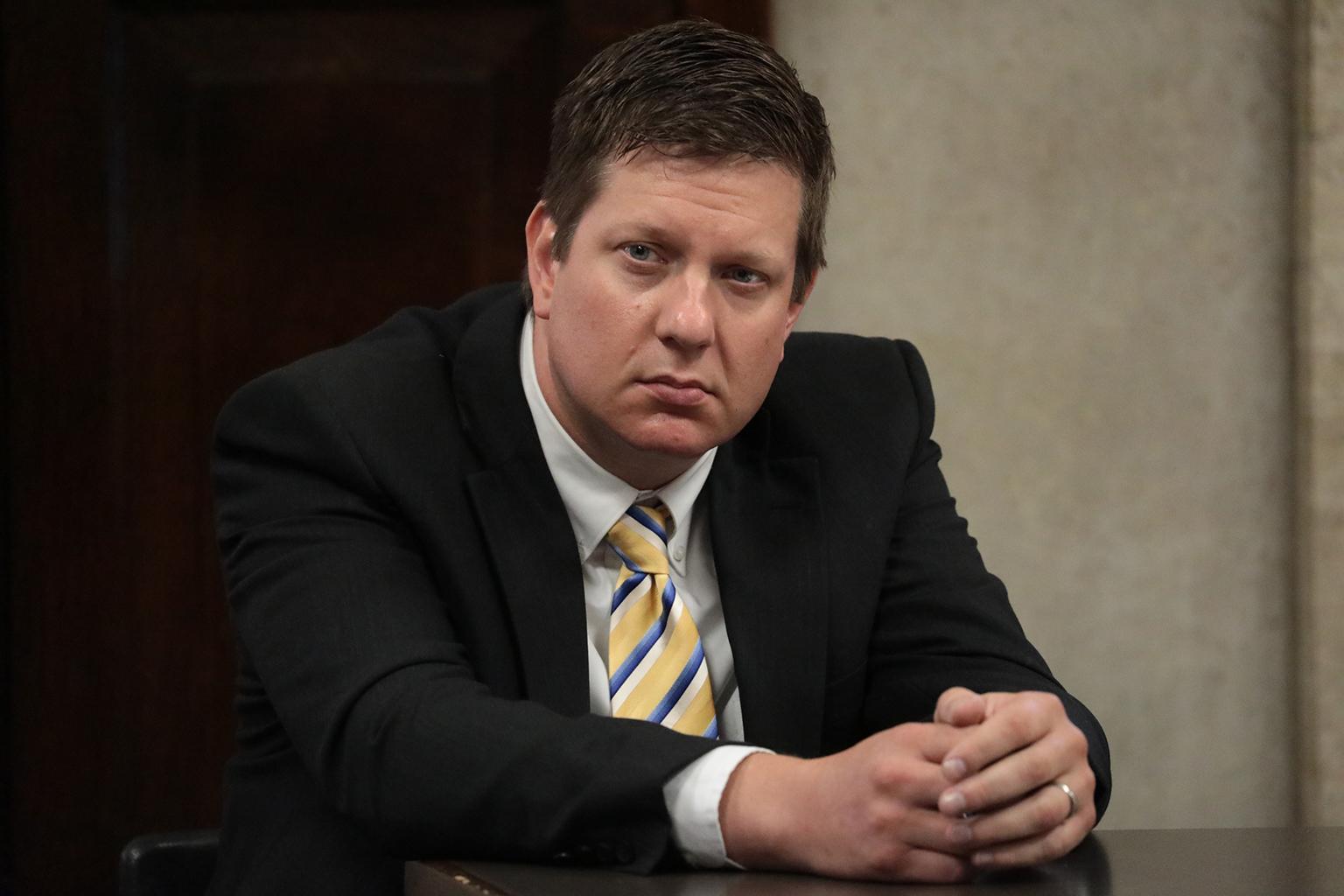 Chicago police Officer Jason Van Dyke listens to testimony at the Leighton Criminal Court Building on Friday, Aug. 3, 2018, during a hearing on the shooting death of Laquan McDonald. (Antonio Perez / Chicago Tribune / Pool)