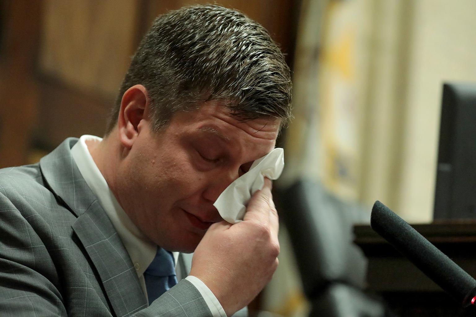 Chicago police Officer Jason Van Dyke wipes away tears on the stand Tuesday, Oct. 2, 2018. (Antonio Perez / Chicago Tribune / Pool) 