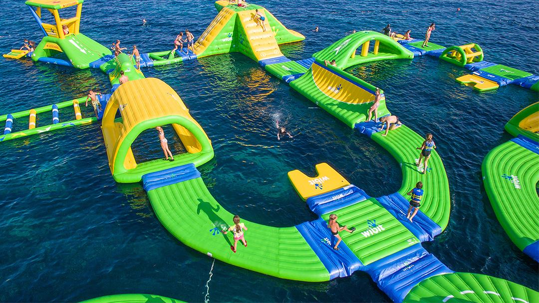 Lake Michigan’s first floating water park features a floating trampoline and slides. (Courtesy of Wibit Sports)