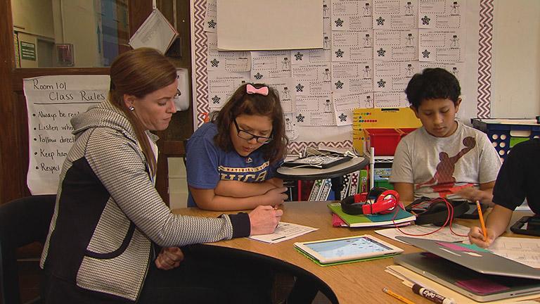 Teacher Whitney Sullivan, left, in her classroom.