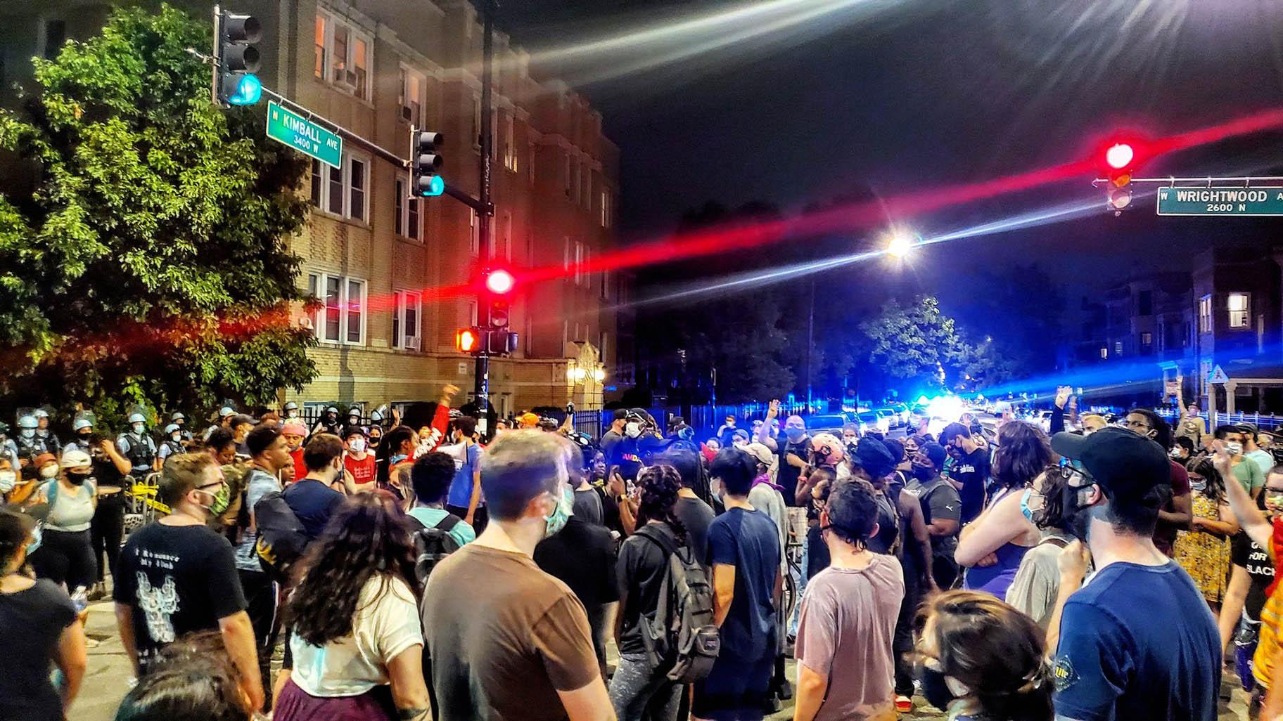 Protesters and police gather in the Logan Square neighborhood on Saturday, July 18, 2020. (@soit_goes / Twitter)