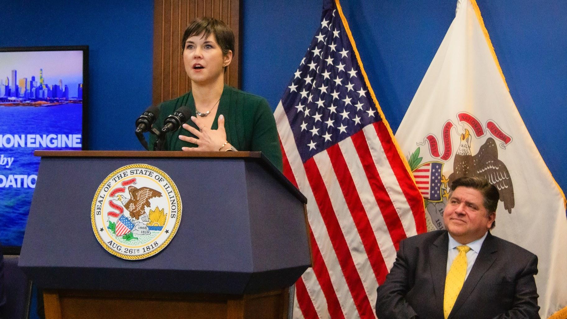 Alaina Harkness, the executive director of the water tech nonprofit Current, appears at a Chicago news conference on Jan. 30, 2024, with Gov. J.B. Pritzker. (Dilpreet Raju  / Capitol News Illinois)