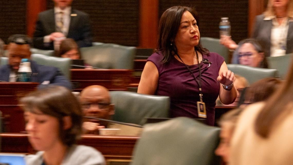 . Theresa Mah, D-Chicago, rushes across the House floor shortly after her bill failed — a rare embarrassment for a lawmaker in the legislature’s supermajority. (Andrew Adams / Capitol News Illinois) . Theresa Mah, D-Chicago, rushes across the House floor shortly after her bill failed — a rare embarrassment for a lawmaker in the legislature’s supermajority. (Andrew Adams / Capitol News Illinois)