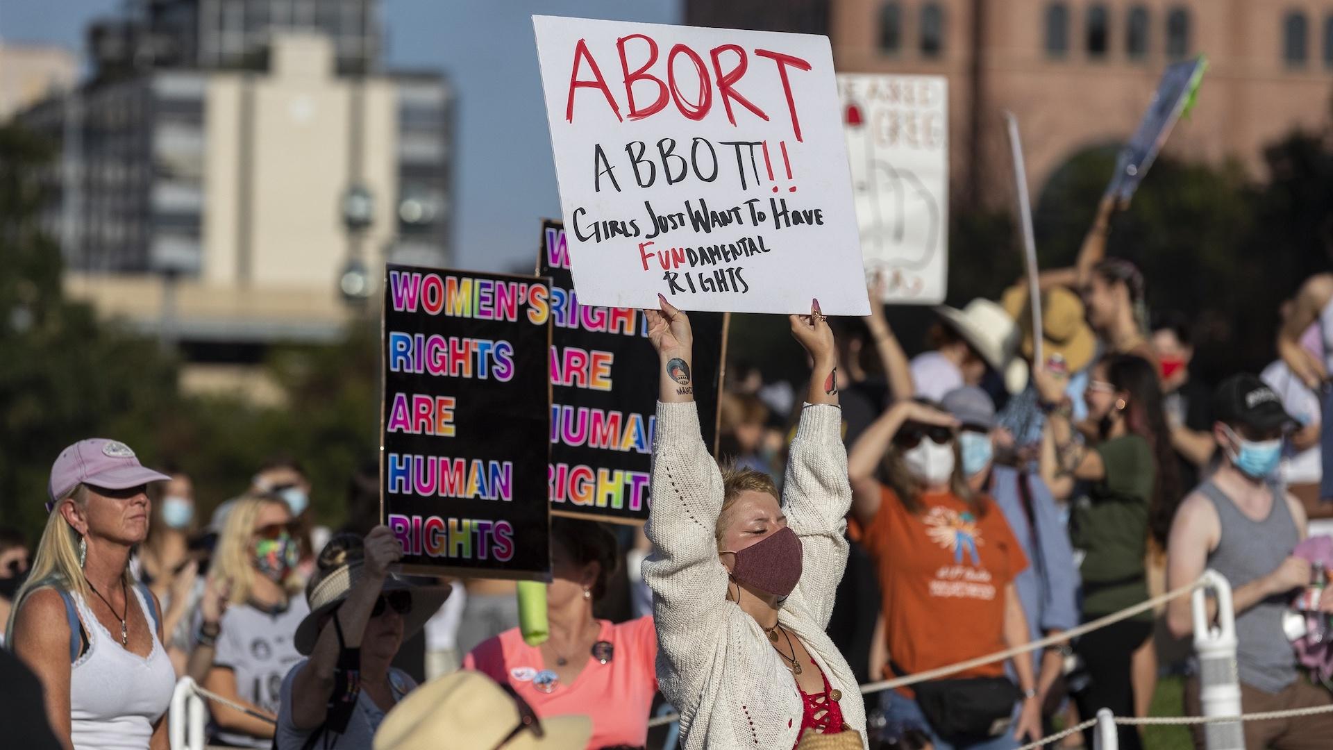 People attend the Women's March ATX rally, Saturday, Oct., 2, 2021, at the Texas State Capitol in Austin, Texas. (AP Photo/Stephen Spillman, File)