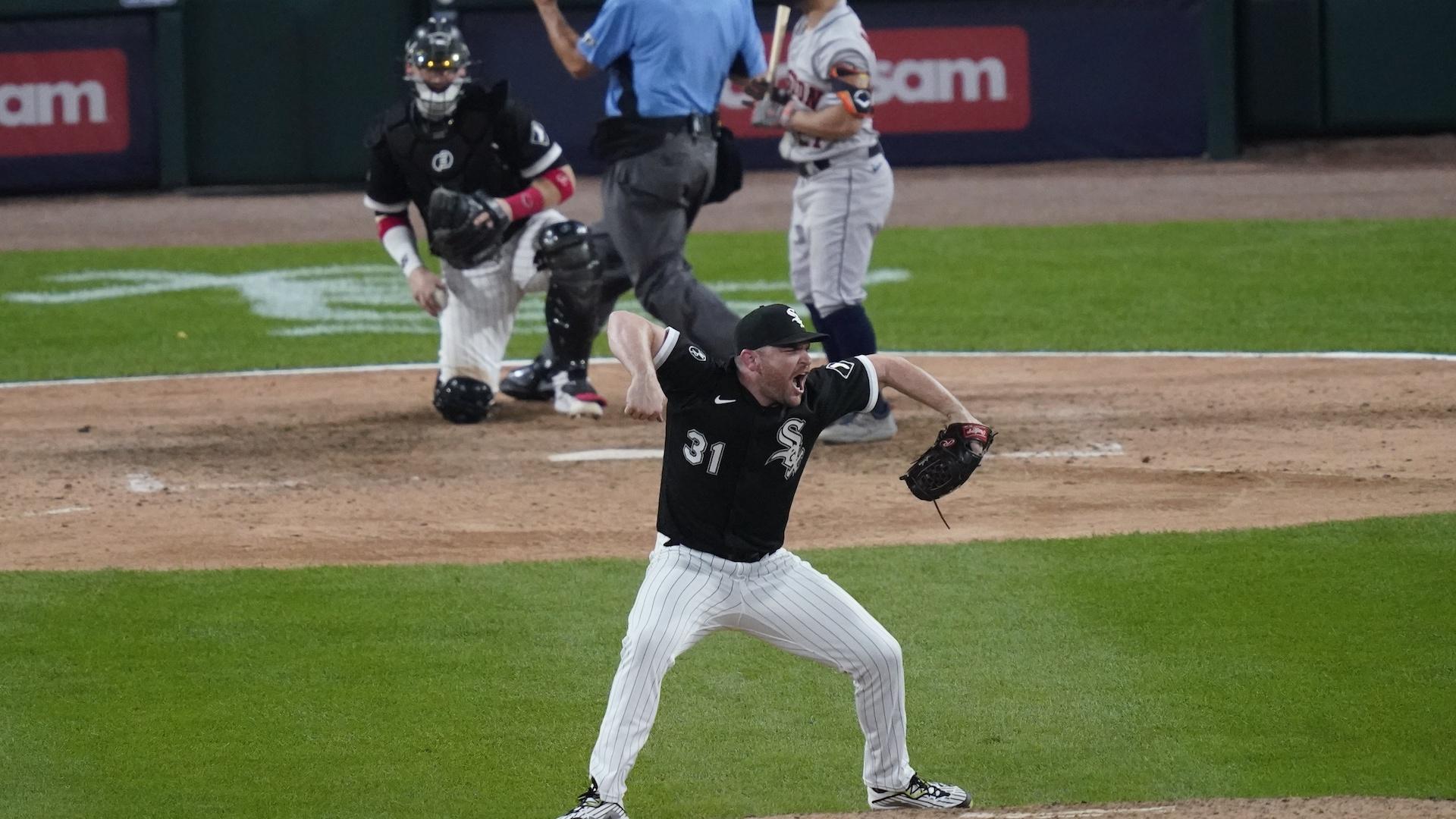 Chicago White Sox relief pitcher Liam Hendriks reacts to the final out against the Houston Astros in the ninth inning during Game 3 of a baseball American League Division Series Sunday, Oct. 10, 2021, in Chicago. (AP Photo/Charles Rex Arbogast)