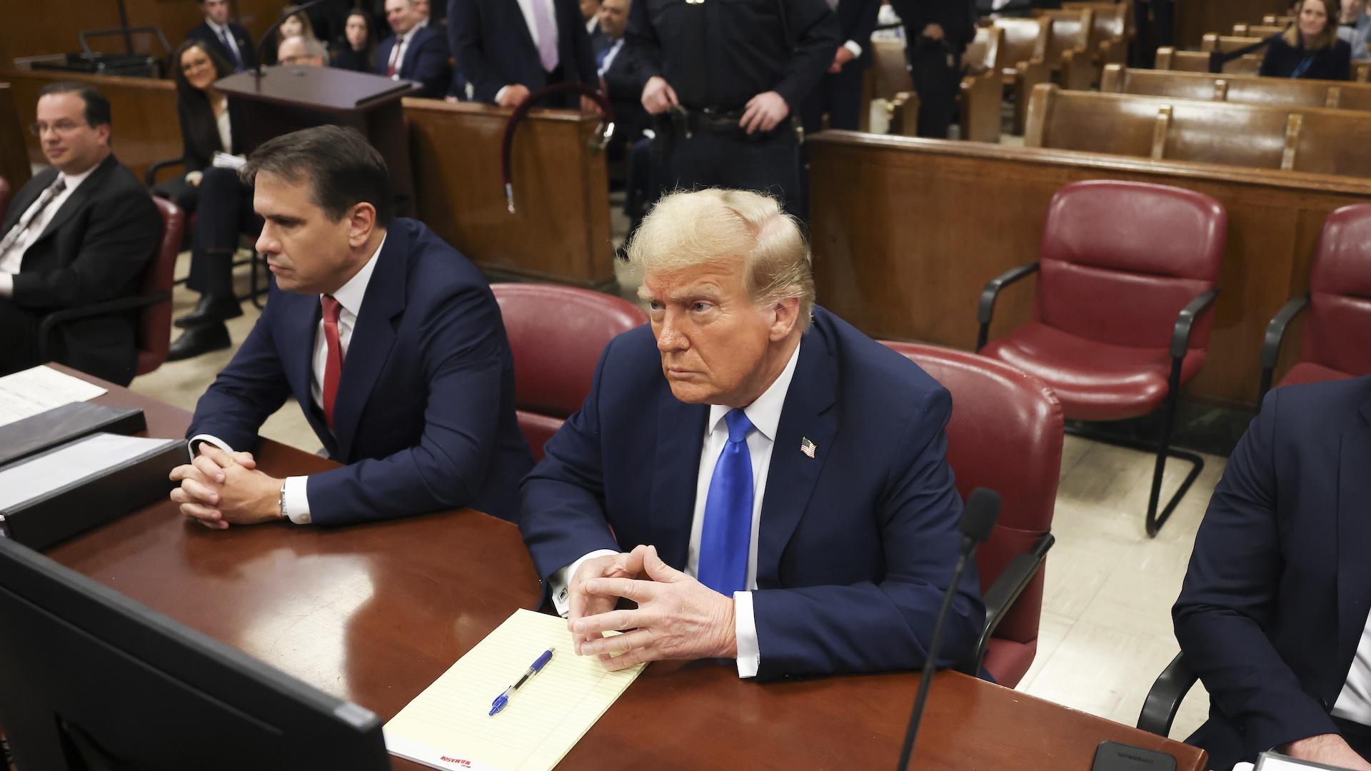 Former president Donald Trump, center, awaits the start of proceedings at Manhattan criminal court, Monday, April 22, 2024, in New York. (AP Photo/Yuki Iwamura, Pool)