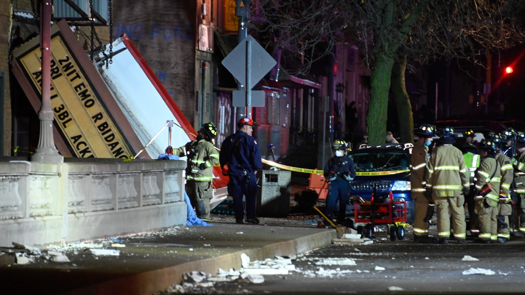 Authorities work the scene at the Apollo Theatre after a severe spring storm caused damage and injuries during a concert, late Friday, March 31, 2023, in Belvidere, Ill. (AP Photo / Matt Marton)