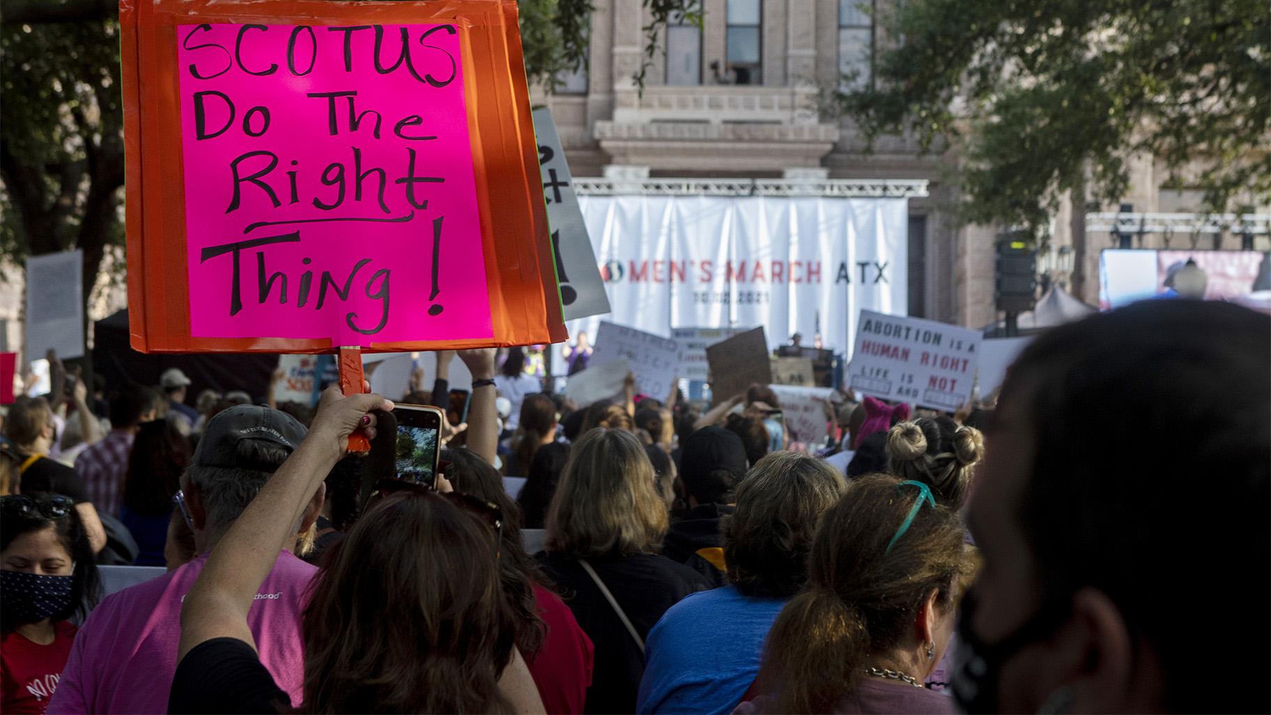 FILE - People attend the Women's March ATX rally, Oct., 2, 2021, at the Texas State Capitol in Austin, Texas. The Texas Supreme Court on Friday paved the way for the nation's toughest abortion law to remain in place in a ruling that again deflated clinics' hopes of stopping — or even pausing — the restrictions anytime soon. (AP Photo / Stephen Spillman, File)