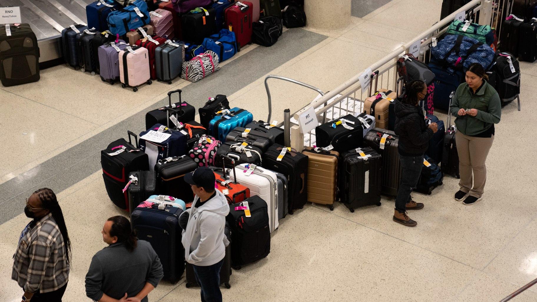Hundreds of Southwest Airlines checked bags are piled together at baggage claim at Midway International Airport as Southwest continues to cancel thousands of flights across the country on Dec. 28, 2022, in Chicago. (AP Photo / Erin Hooley, File)