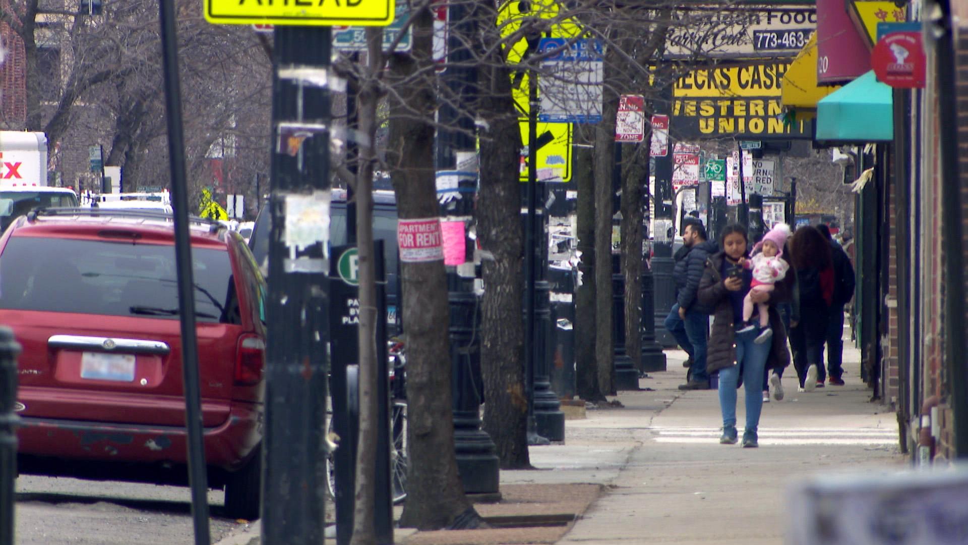 Businesses line a street in the Albany Park neighborhood. (WTTW News)