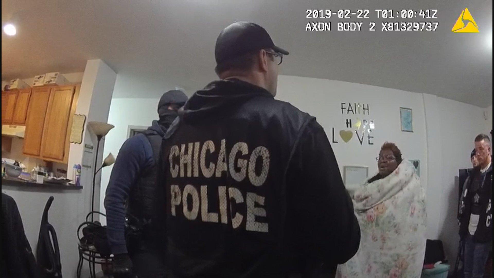 A still image from a Chicago Police Department body camera video shows a police raid at the home of Anjanette Young in February 2019. (WTTW News via Ja’Mal Green)