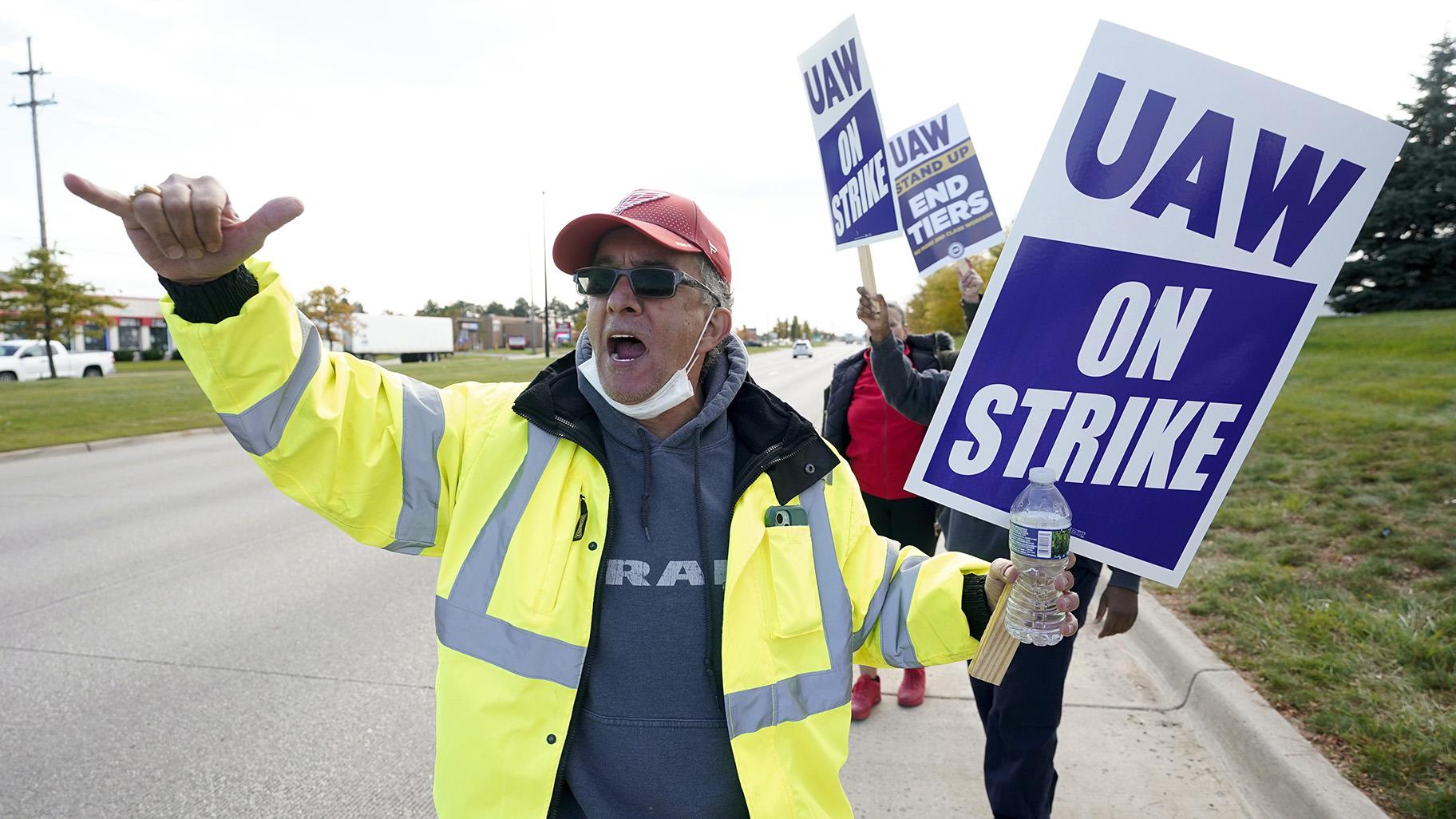 George Raad, a United Auto Worker member, walks the picket line during a strike at the Stellantis Sterling Heights Assembly Plant, in Sterling Heights, Mich., Monday, Oct. 23, 2023. (AP Photo / Paul Sancya)