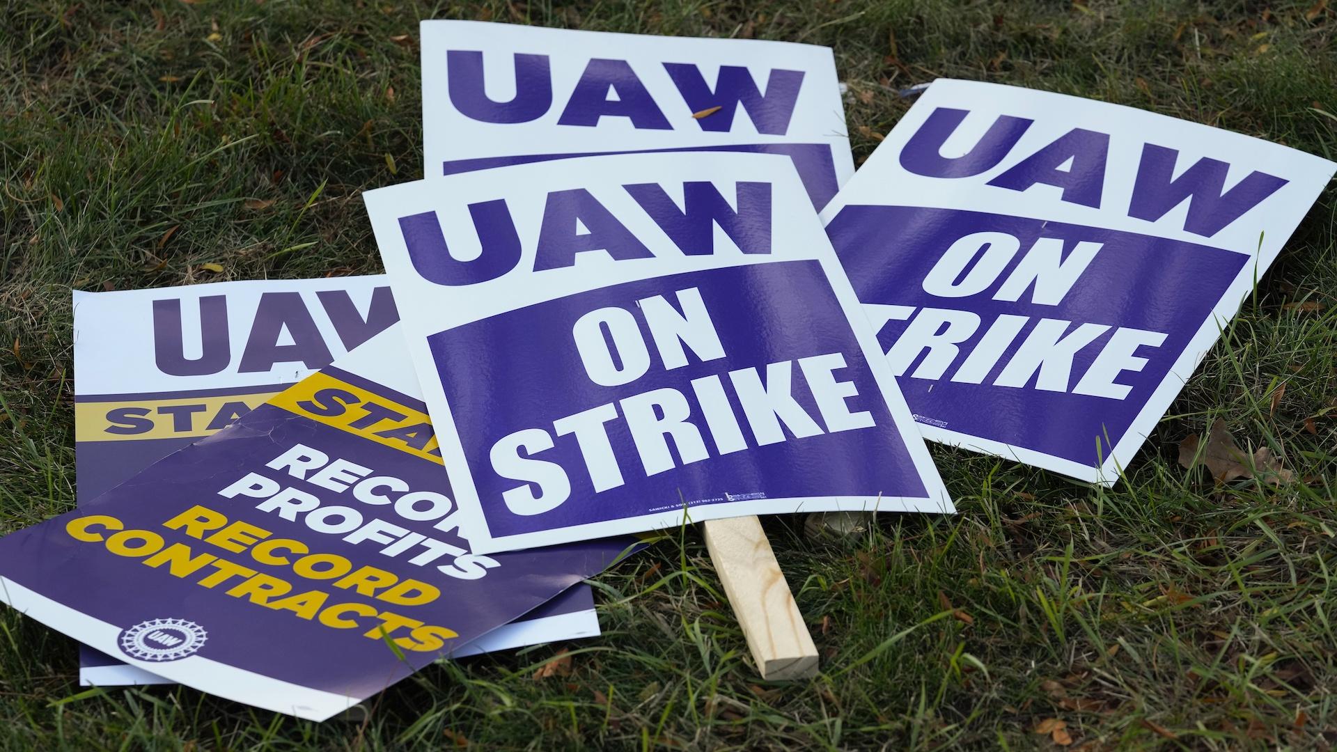 United Auto Workers signs for a strike are shown at the Stellantis Sterling Heights Assembly Plant, in Sterling Heights, Mich., Monday, Oct. 23, 2023. (AP Photo/Paul Sancya, File)