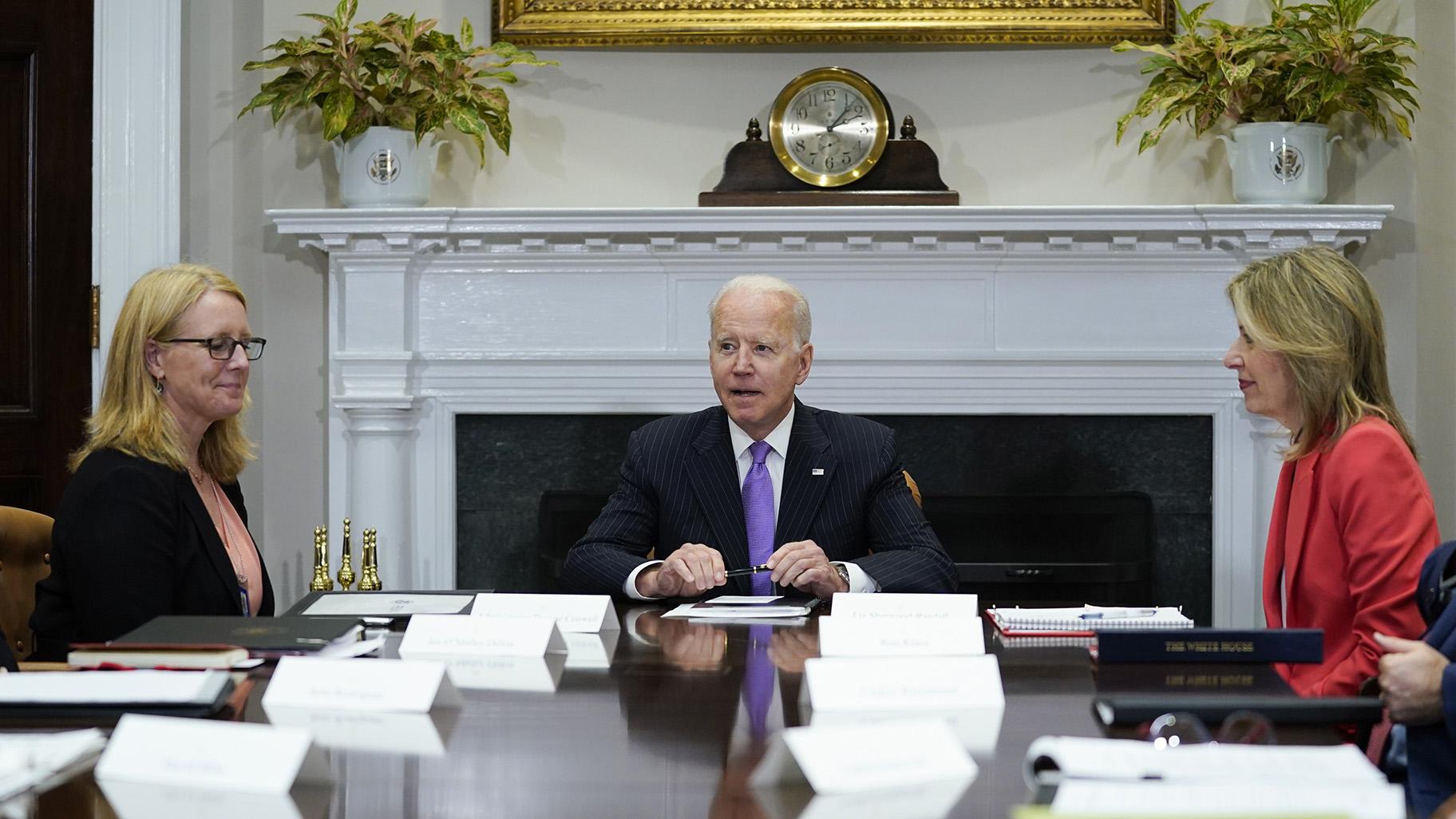 President Joe Biden speaks during a meeting with FEMA Administrator Deanne Criswell, left, and Homeland Security Adviser and Deputy National Security Adviser Elizabeth Sherwood-Randall, right, in the Roosevelt Room of the White House, Tuesday, June 22, 2021, in Washington. (AP Photo / Evan Vucci)