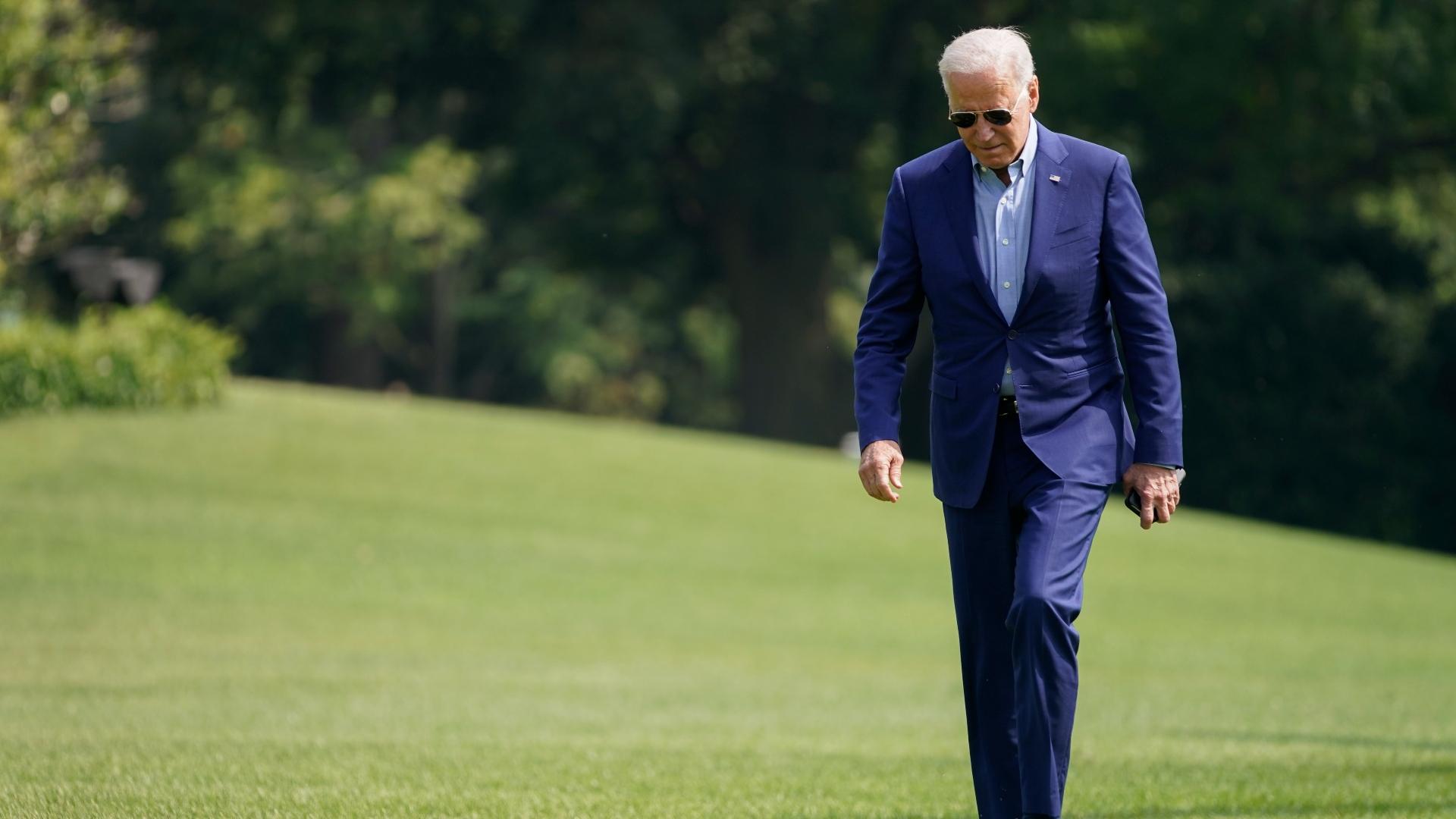 President Joe Biden walks on the South Lawn of the White House after stepping off Marine One, Sunday, July 25, 2021, in Washington. Biden is returning to Washington after spending the weekend in Delaware. (AP Photo / Pablo Martinez Monsivais)