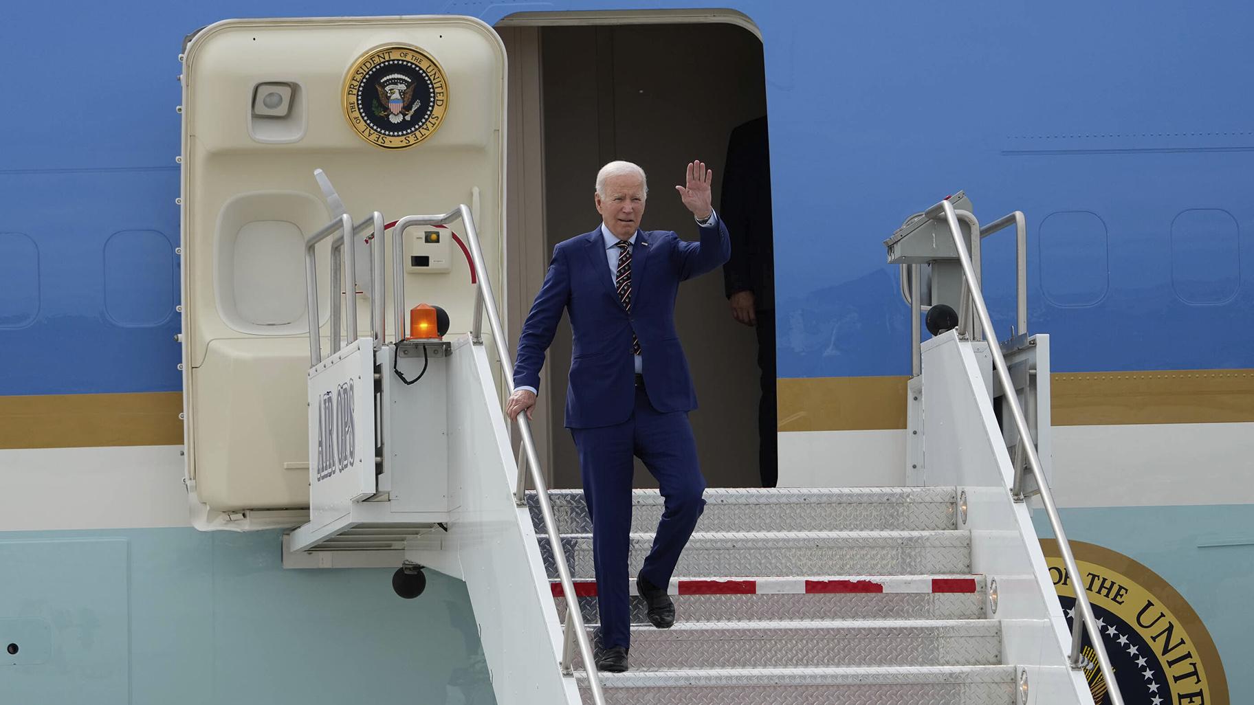 President Joe Biden exits Air Force One after landing at Roland R. Wright Air National Guard Base, Wednesday, Aug. 9, 2023, in Salt Lake City. (Francisco Kjolseth / The Salt Lake Tribune via AP)