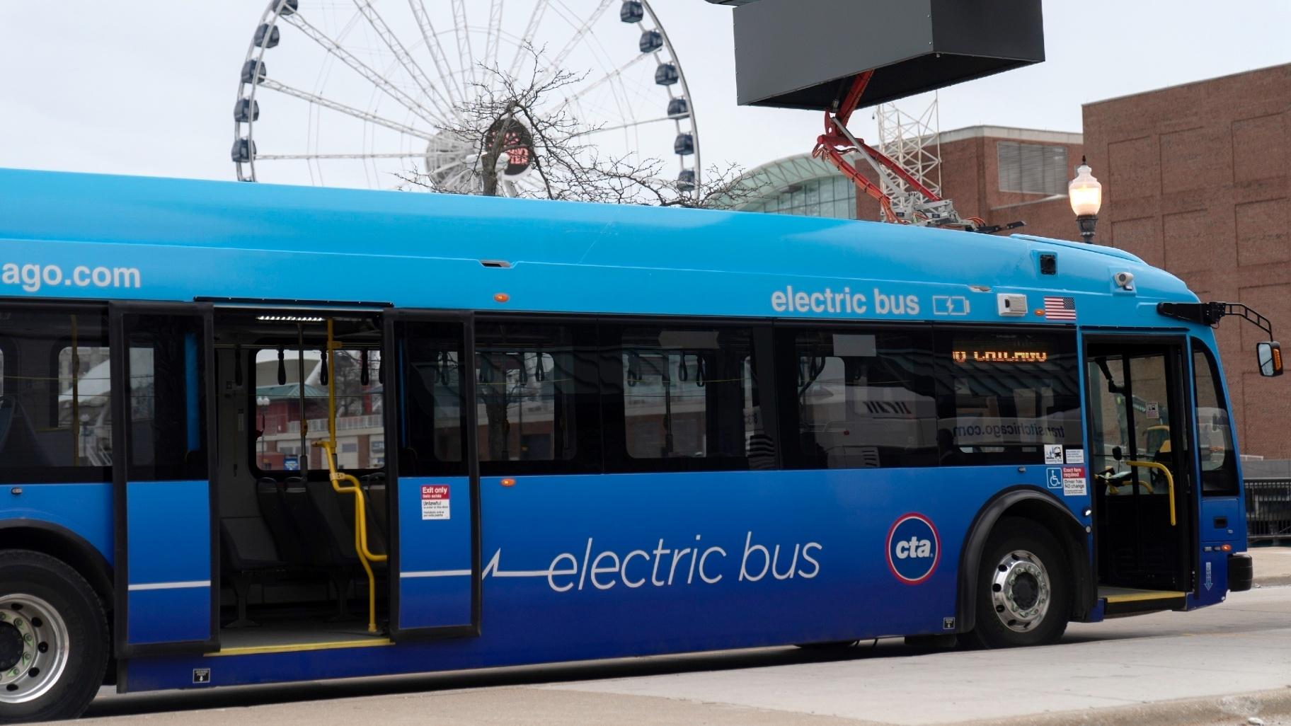 FILE - A Chicago Transit Authority electric bus charges at Navy Pier Tuesday, Feb. 14, 2023, in Chicago. (Erin Hooley / AP Photo, File)