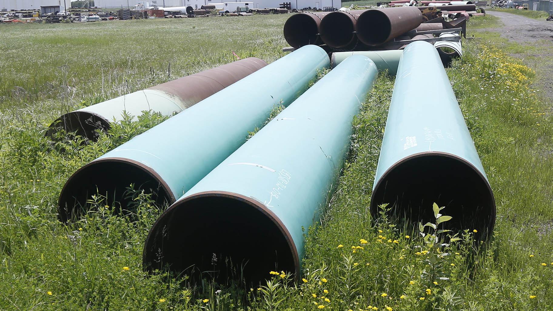 Pipeline used to carry crude oil is shown at the Superior, Wis., terminal of Enbridge Energy, June 29, 2018. (AP Photo / Jim Mone, File)