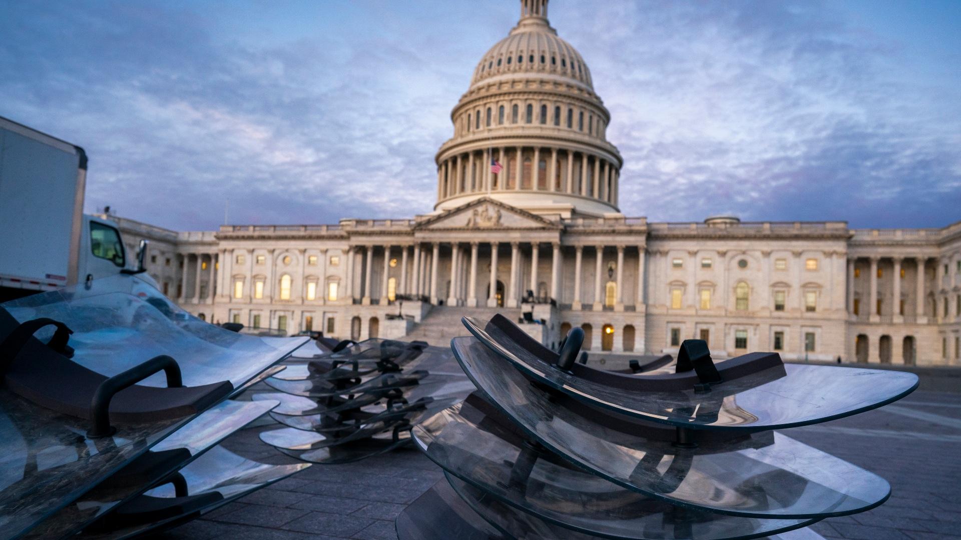 Riot shields are stacked at the ready as National Guard troops reinforce the security zone on Capitol Hill in Washington, Tuesday, Jan. 19, 2021, before President-elect Joe Biden is sworn in as the 46th president on Wednesday. (AP Photo / J. Scott Applewhite)