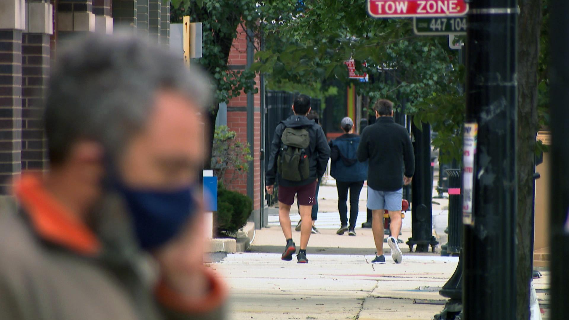 Pedestrians in Chicago’s Northalsted neighborhood on a September day. (WTTW News)