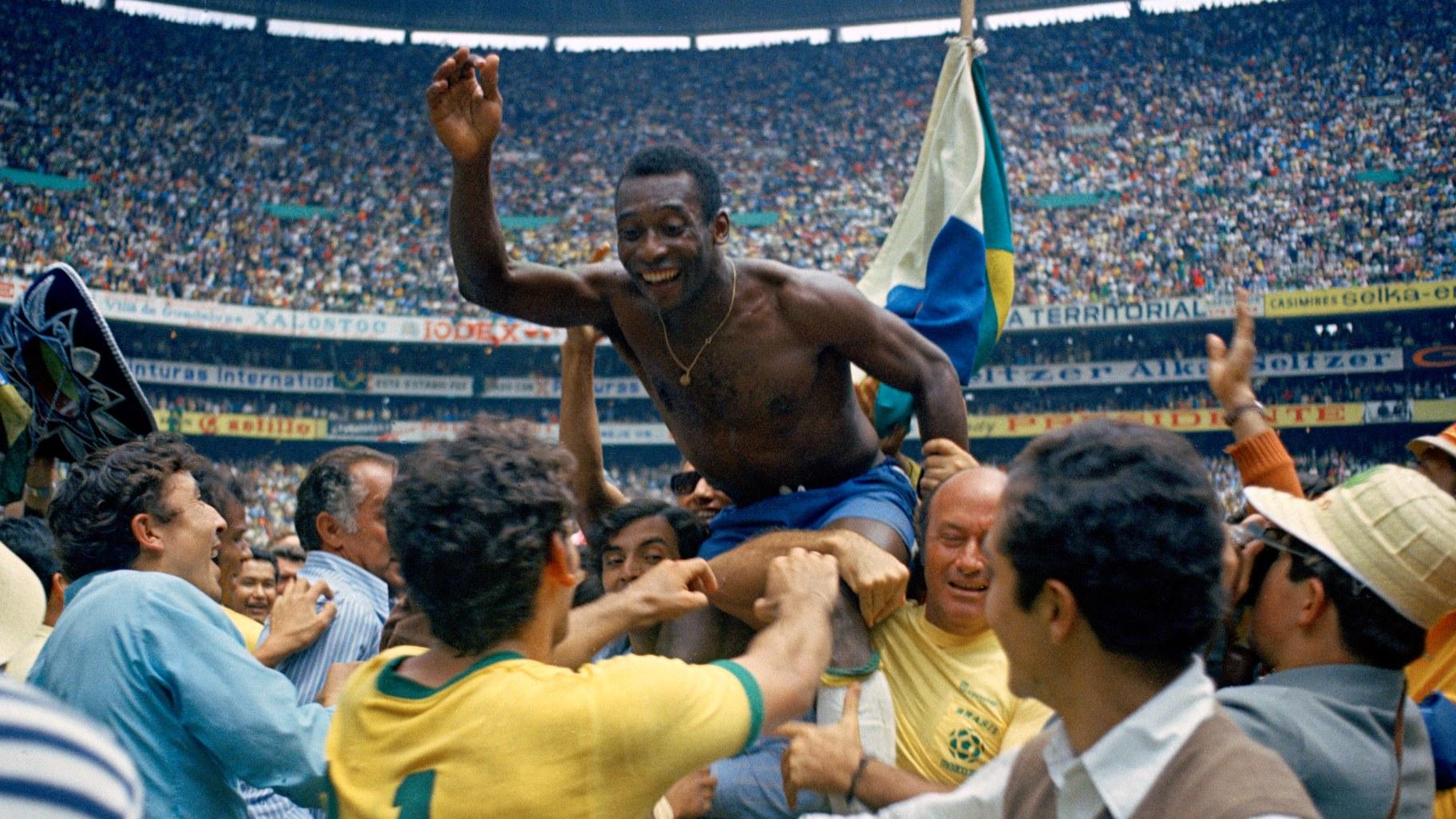 Brazil’s Pele is hoisted on the shoulders of his teammates after Brazil won the World Cup final against Italy, 4-1, in Mexico City’s Estadio Azteca, June 21, 1970. (AP Photo, File)