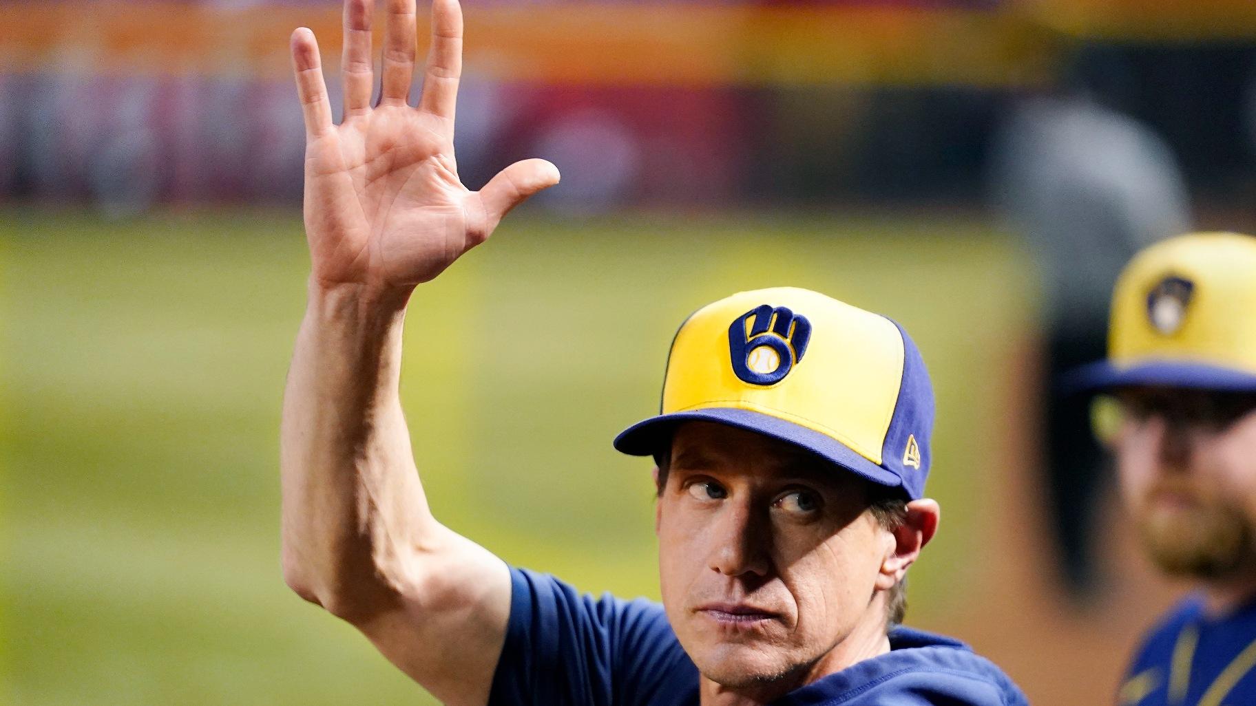 Milwaukee Brewers manager Craig Counsell waves to the crowd as he is honored as a former Arizona Diamondbacks player, during the fourth inning of the team’s baseball game against the Diamondbacks on Tuesday, April 11, 2023, in Phoenix. (AP Photo / Ross D. Franklin, File)