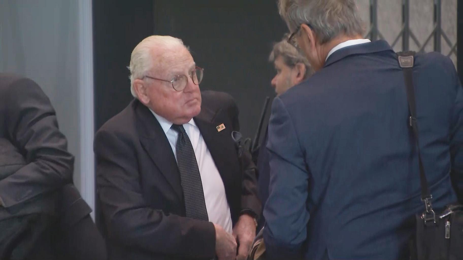 Former Chicago Ald. Ed Burke makes his way through security at the Dirksen Courthouse on Nov. 6, 2023. (WTTW News)