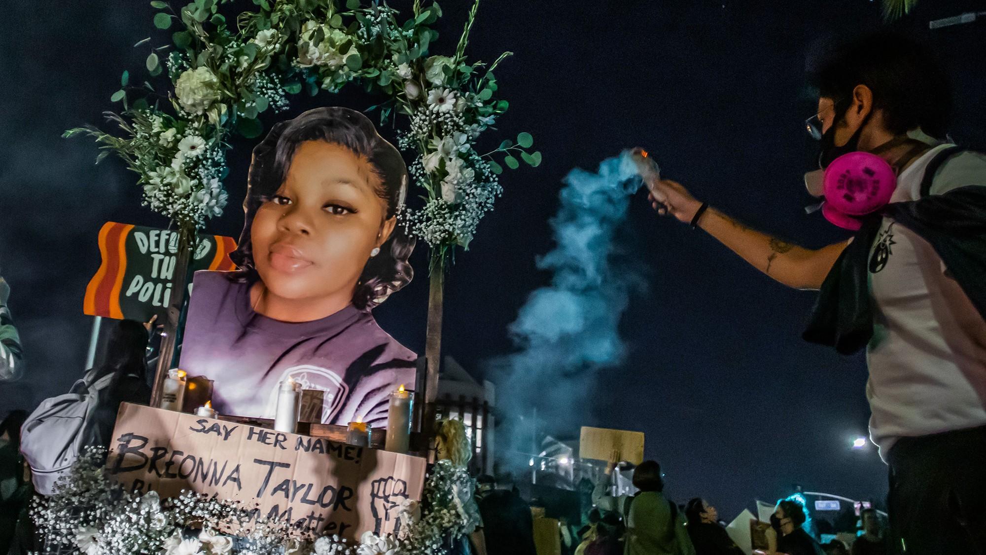 Protesters march against police brutality in Los Angeles, on Sept. 23, 2020, following a decision on the Breonna Taylor case in Louisville, Kentucky. (Apu Gomes / AFP / Getty Images)