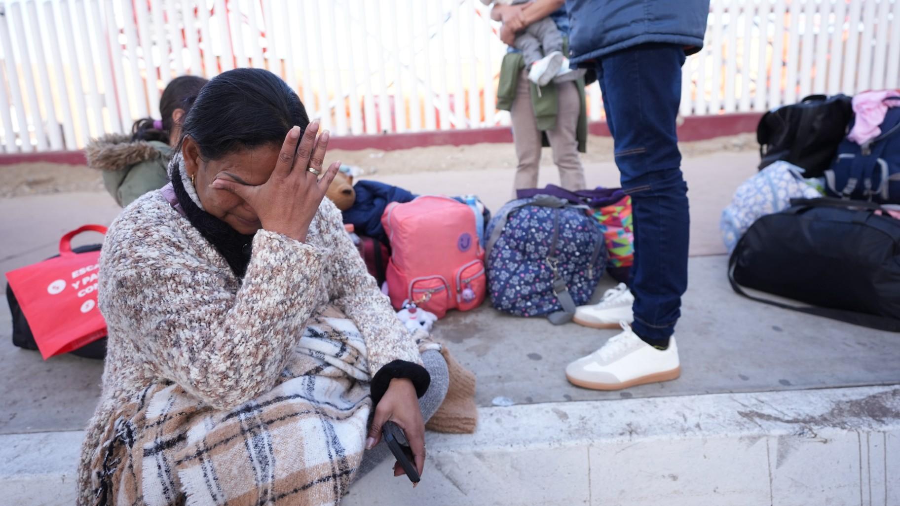 Maria Mercado, who is from Colombia but arrived from Ecuador, gets emotional as she sees that her 1pm appointment was canceled on the U.S. Customs and Border Protection (CBP) One app, as she and her family wait at the border crossing in Tijuana, Mexico on Monday, Jan. 20. 2025. (AP Photo / Gregory Bull) Maria Mercado, who is from Colombia but arrived from Ecuador, gets emotional as she sees that her 1pm appointment was canceled on the U.S. Customs and Border Protection (CBP) One app, as she and her family wait at the border crossing in Tijuana, Mexico on Monday, Jan. 20. 2025. (AP Photo / Gregory Bull)