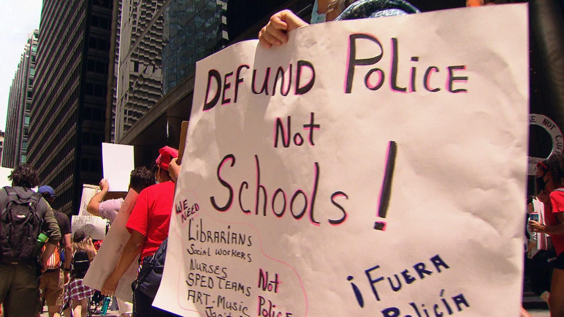 Demonstrators march in Chicago on Wednesday, June 24, 2020 to show their support for removing police officers from schools. (WTTW News)