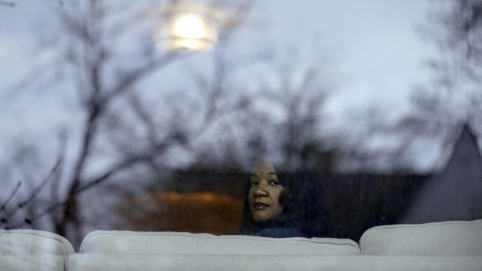 Robin Rue Simmons, alderwoman of Evanston’s 5th Ward and a fourth generation Black resident poses for a portrait in her home in Evanston, Ill., Friday, April 9, 2021.  (AP Photo / Shafkat Anowar, File)