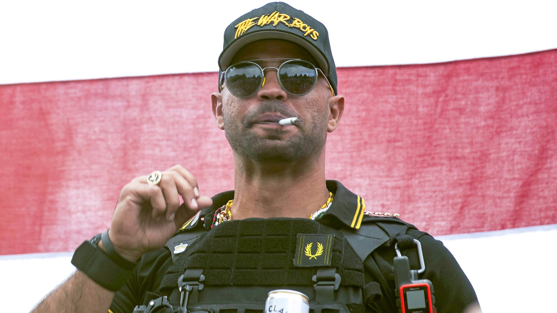 In this Sept. 26, 2020, file photo, Proud Boys leader Henry “Enrique” Tarrio wears a hat that says The War Boys during a rally in Portland, Ore. (AP Photo / Allison Dinner, File)